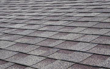 Winsick tiles for shallow pitch roofing
